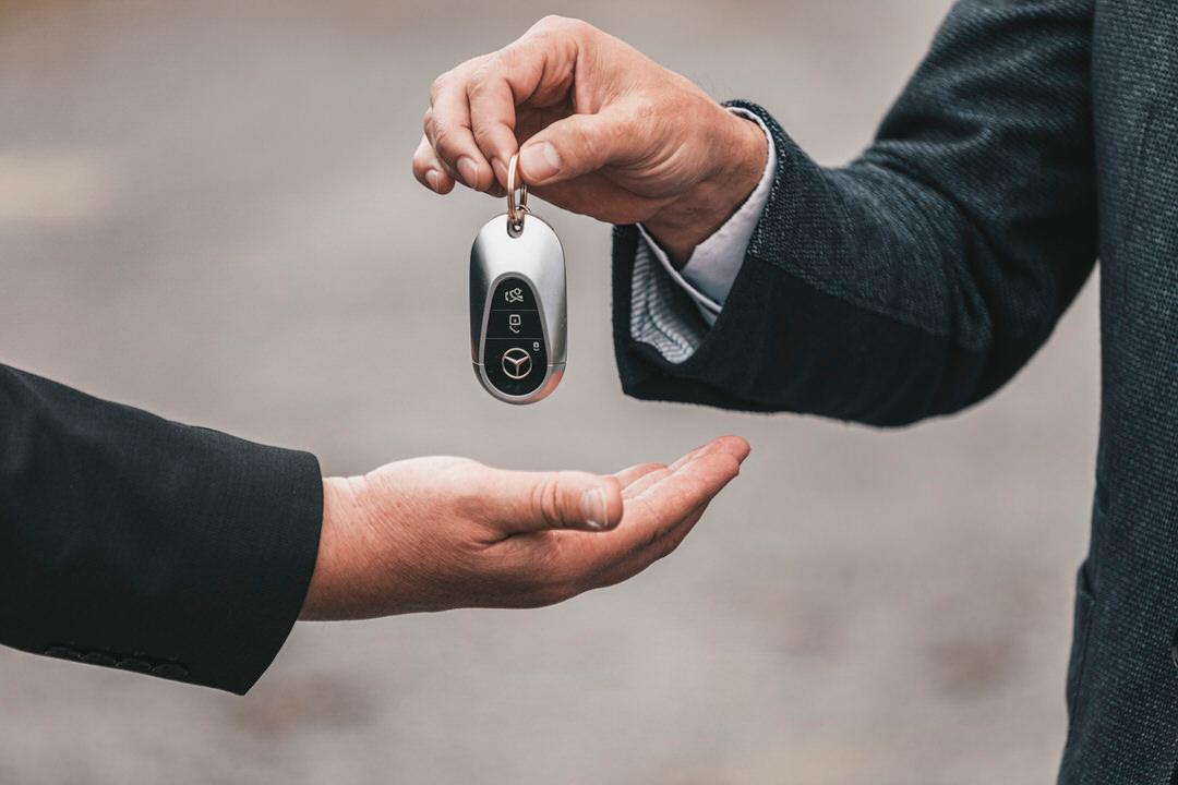 Handing over car key